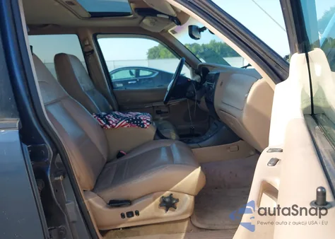 1999 Ford Explorer z USA, uszkodzony, nr VIN 1FMZU34E4XUA06563